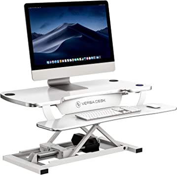 Photo 1 of VERSADESK Electric Standing Desk Converter, PowerPro Height-Adjustable Sit Stand Desktop Riser with Keyboard Tray, USB Charging Port, 36" X 24", White
