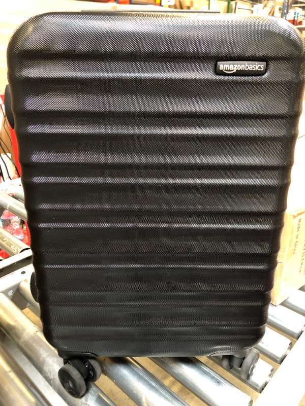 Photo 1 of Amazon Basics Oxford Expandable Spinner Luggage Suitcase with TSA Lock - 30.1 Inch, Black