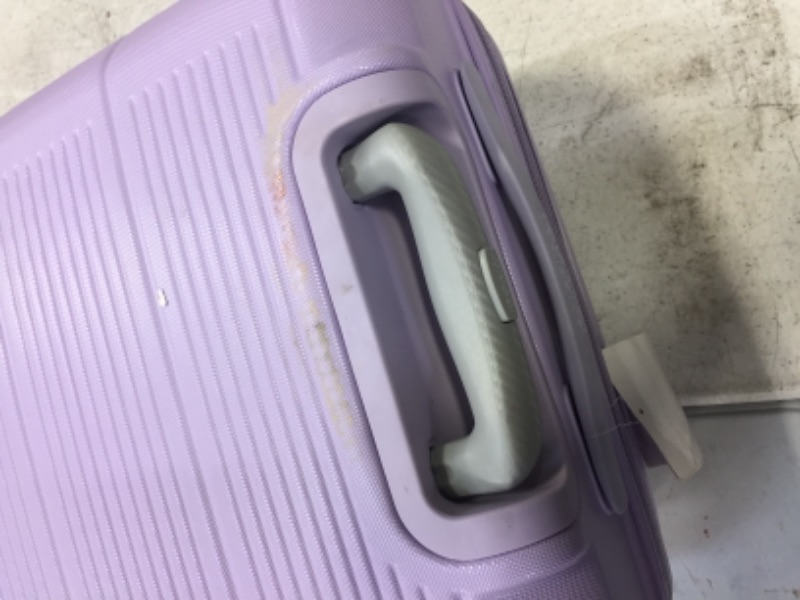Photo 2 of 2 purple american tourister luggage is really dirty but brand new with tags 