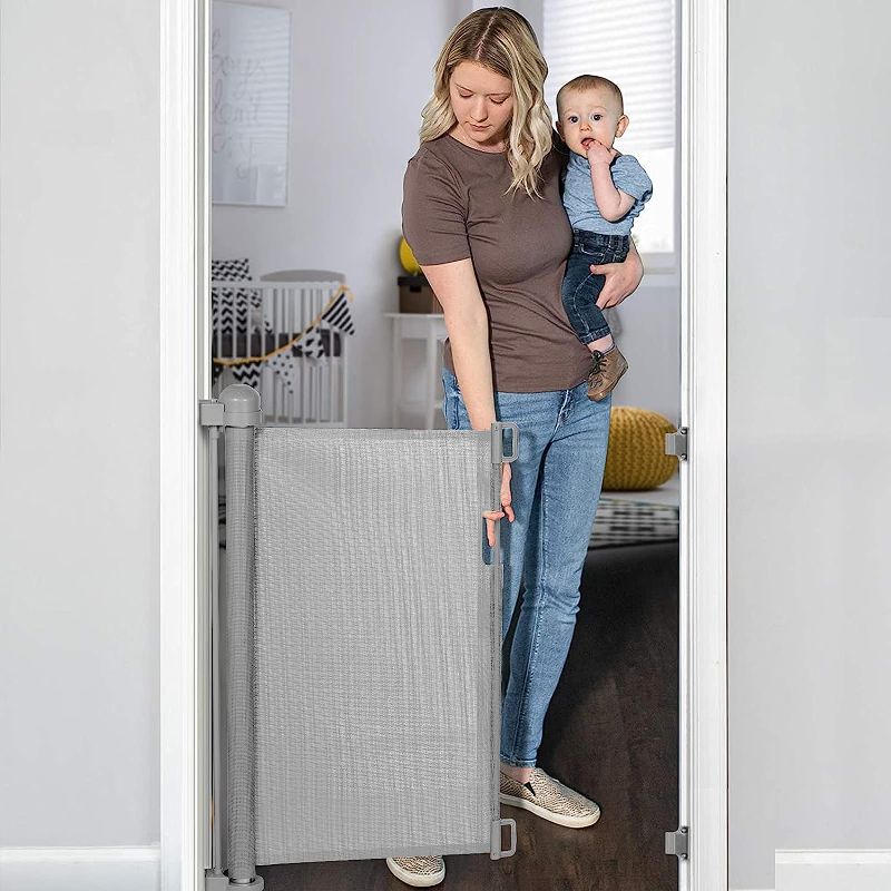 Photo 1 of YOOFOR Retractable Baby Gate, Extra Wide Safety Kids or Pets Gate, 33” Tall, Extends to 55” Wide, Mesh Safety Dog Gate for Stairs, Indoor, Outdoor, Doorways, Hallways (Grey, 33x55 Inch (Pack of 1)