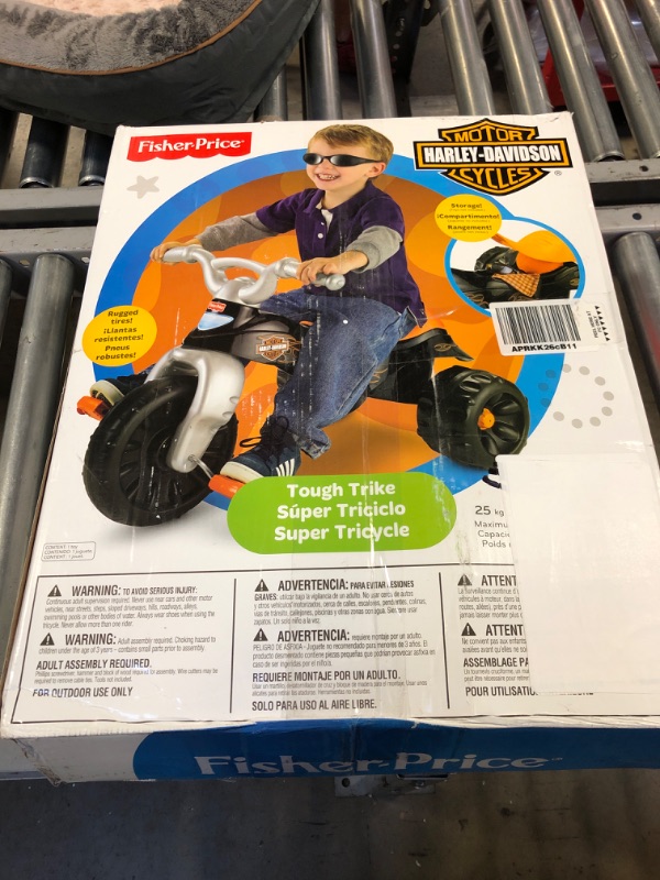 Photo 3 of Fisher-Price Harley-Davidson Tricycle with Handlebar Grips and Storage Area, Multi-Terrain Tires, Tough Trike [Amazon Exclusive]