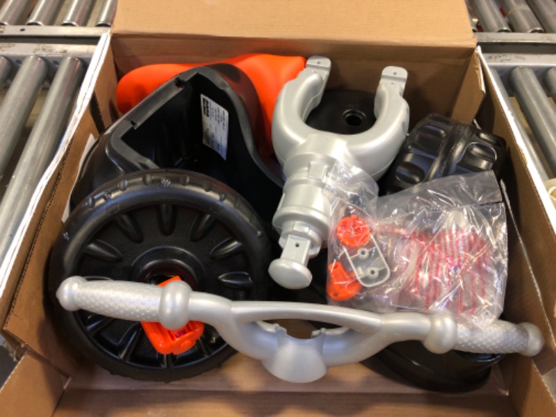 Photo 2 of Fisher-Price Harley-Davidson Tricycle with Handlebar Grips and Storage Area, Multi-Terrain Tires, Tough Trike [Amazon Exclusive]