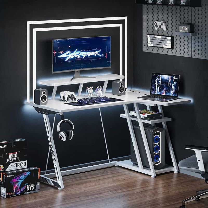 Photo 1 of MOTPK Gaming Desk L Shaped, Small Corner Desk with Storage Shelf & Power Outlets, Computer Desk with Monitor Shelf, L Shaped Desk with Carbon Fiber Surface, Gamer Desk Gaming Table, Snow White, 55 Inch
