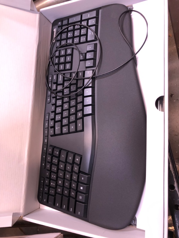 Photo 2 of Microsoft Ergonomic Keyboard - Black. Wired, Comfortable, Ergonomic Keyboard with Cushioned Wrist and Palm Support. Split Keyboard. Dedicated Office Key.