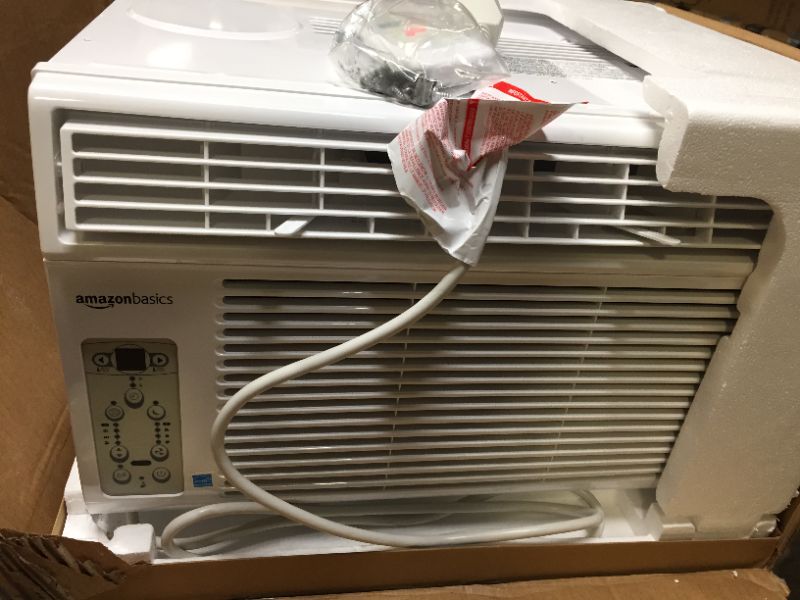 Photo 4 of Amazon Basics Window-Mounted Air Conditioner with Remote - Cools 250 Square Feet, 6000 BTU, Energy Star, Energy Star