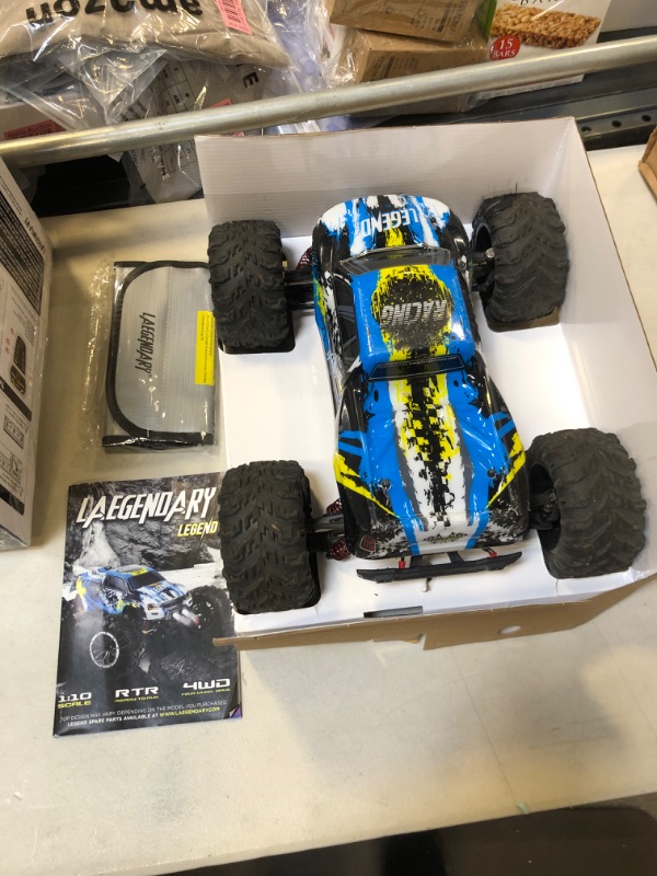 Photo 2 of LAEGENDARY Fast RC Cars for Adults and Kids - 4x4, Off-Road Remote Control Car - Battery-Powered, Hobby Grade, Waterproof Monster RC Truck - Toys and Gifts for Boys, Girls and Teens Red - Yellow Red Yellow Up to 31 mph