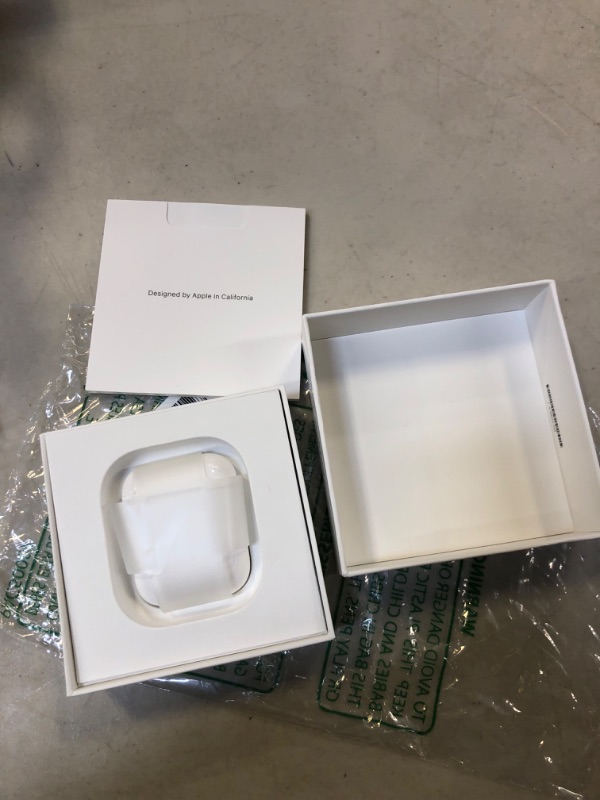 Photo 4 of Apple AirPods with Charging Case (Latest Model)