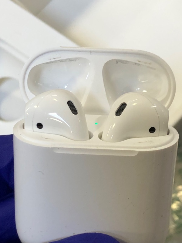 Photo 3 of Apple AirPods with Charging Case (Latest Model)