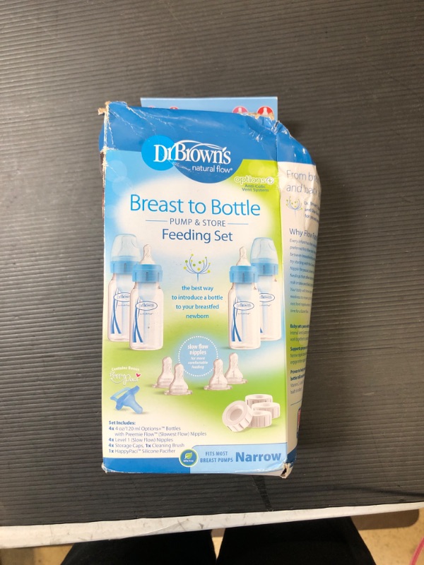 Photo 4 of Dr. Brown’s Natural Flow® Anti-Colic Options+™ Narrow Breast to Bottle Pump & Store Feeding Set with Slow Flow Nipples, Baby Bottle Travel Caps and 100% Silicone HappyPaci™ One-Piece Pacifier, Blue Breast to Bottle Feeding Set, Blue