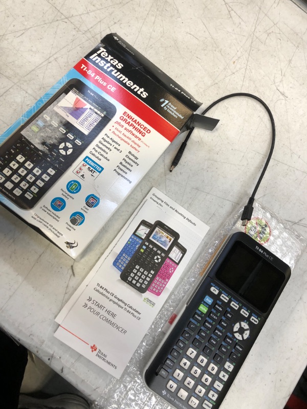 Photo 1 of Texas Instruments TI-84 Plus CE Graphing Calculator - 10 Digits - Color Display - Black