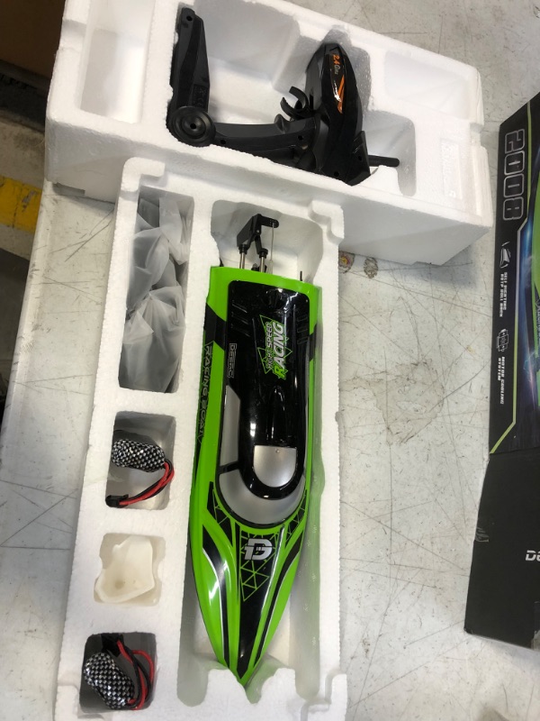 Photo 2 of DEERC RC Boat with LED Light, 30+ Mins, Self Righting Remote Control Boat for Pools & Lakes, 20+ MPH, 2.4GHz Racing Boats, 2 Battery, Pool Toys for Kids, Radio Controlled Watercraft