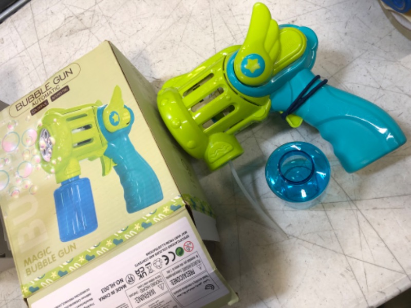 Photo 2 of Bubble Machine Gun for Kids, Bubble Blower for 3 4 5 6 7 8 Years Old Toddlers Boys Girls, Automatic Bubble Maker, Handheld Fan Bubble Summer Toy for Wedding Birthday Party Camping Outdoor Pool Bath
