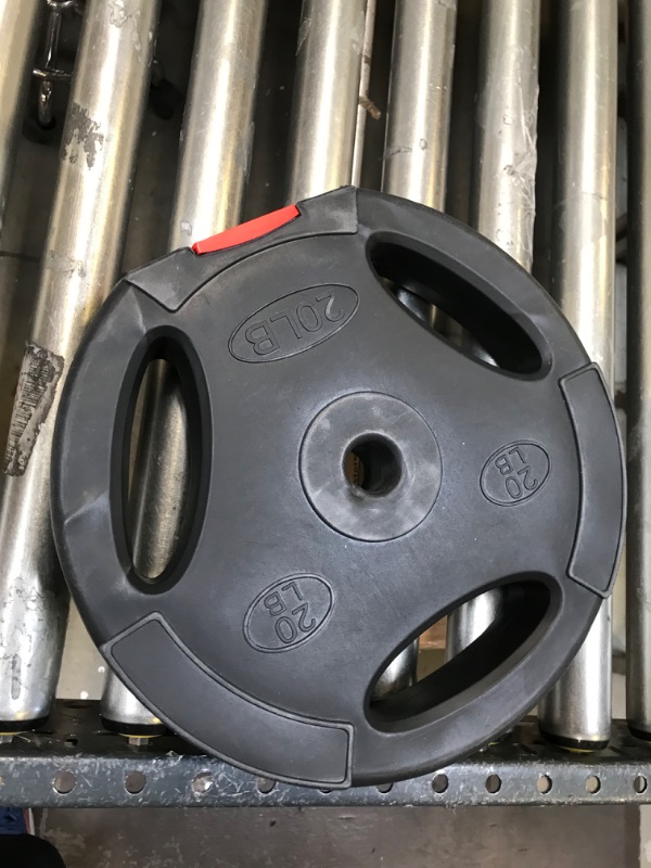 Photo 1 of 1 20LB  PLASTIC WEIGHT INCH HOLE