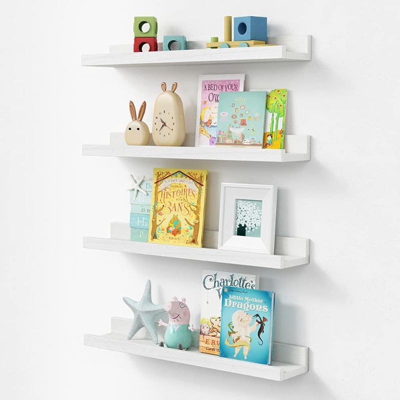 Photo 1 of Forbena Nursery Floating Shelves for Wall, 23 Inch Long Nursery Book Shelves Set of 4, Rustic Wood Picture Ledge Shelf for Bedroom, Bathroom, Living Room, Photo Frames, Office Decor (White)
