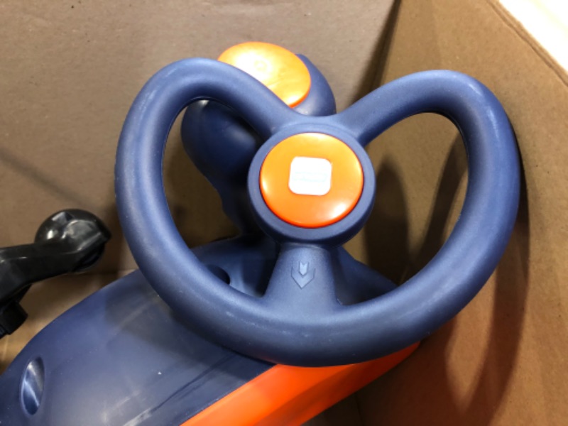 Photo 5 of Electric Wiggle Car Ride On Toy, ANPABO 2 in 1 Wiggle Car with Rechargable Battery and Pedal, Anti-Rollover Wheels with Colorful Lights, Swing Car for Toddlers and Kids Age 3 Year up Orange --------- MISSING POWER CORD