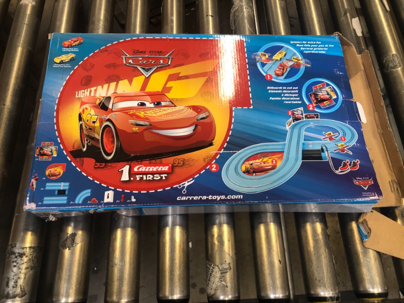 Photo 2 of Carrera First Disney/Pixar Cars - Slot Car Race Track - Includes 2 Cars: Lightning McQueen and Dinoco Cruz - Battery-Powered Beginner Racing Set for Kids Ages 3 Years and Up Disney Cars w/ Spinners