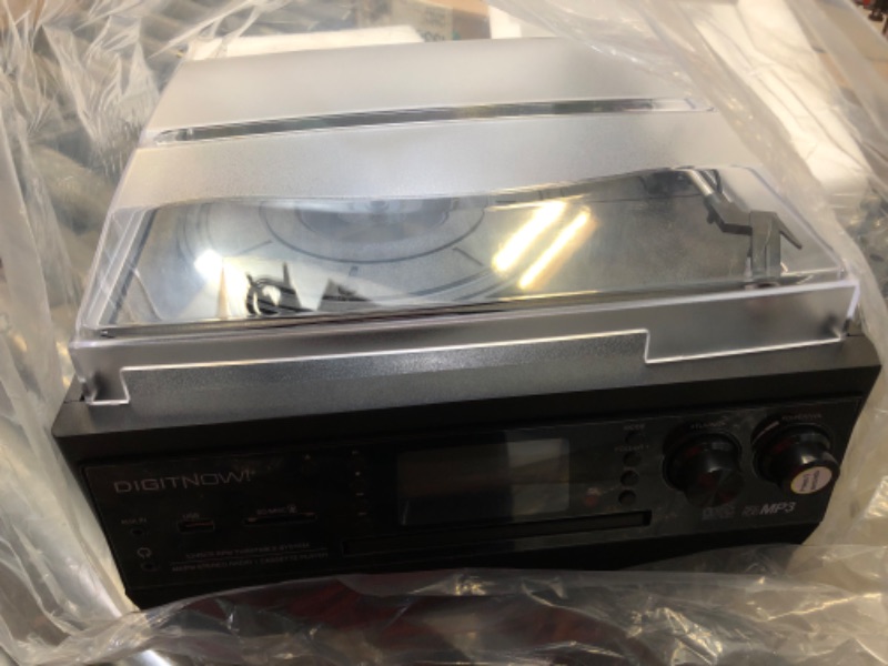 Photo 1 of DIGITNOW Bluetooth Record Player Turntable with Stereo Speaker, LP Vinyl to MP3 Converter with CD, Cassette, Radio, Aux in and USB/SD Encoding, Remote Control, Audio Music Player Built in Amplifier
SLIGHTLY USED**********