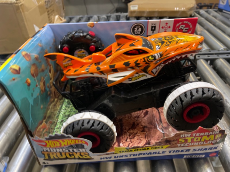 Photo 3 of Hot Wheels Monster Trucks, Remote Control Car, Monster Truck Toy with All-Terrain Wheels, 1:15 Scale Unstoppable Tiger Shark RC