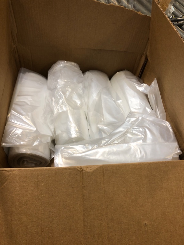 Photo 1 of 5 rolls of clear trash bags 