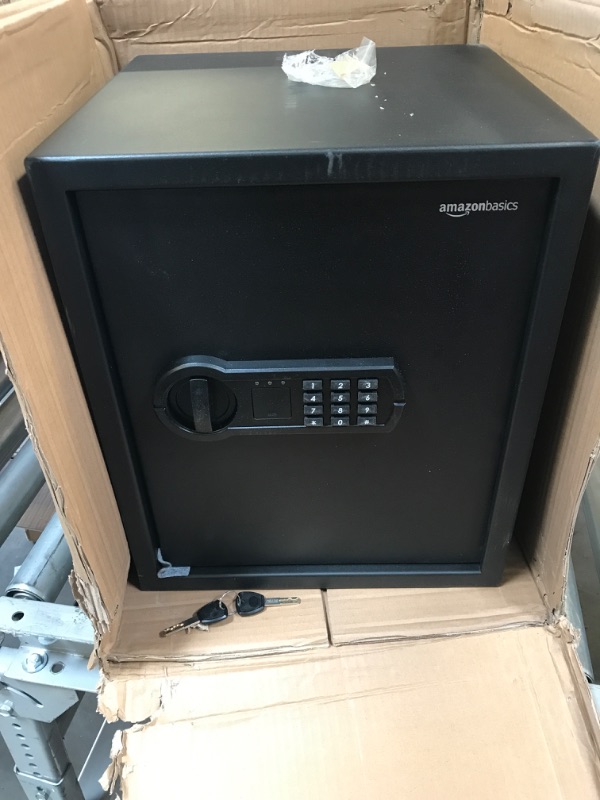 Photo 2 of Amazon Basics Steel Home Security Safe with Programmable Keypad - 1.52 Cubic Feet, 13.8 x 13 x 16.5 Inches, Black & 8-Sheet Capacity, Cross-Cut Paper and Credit Card Shredder, 4.1 Gallon 1.52 Cubic Feet Keypad Lock + Shredder, 4.1 Gallon HAS SCUFF MARKS 