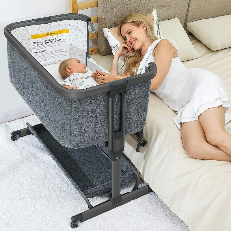 Photo 1 of AMKE 3 in 1 Baby Bassinets,Bedside Sleeper for Baby,Baby Cradle with Storage Basket, Easy to Assemble Bassinet for Newborn/Infant, Adjustable Bedside Crib,Safe Portable Baby Bed