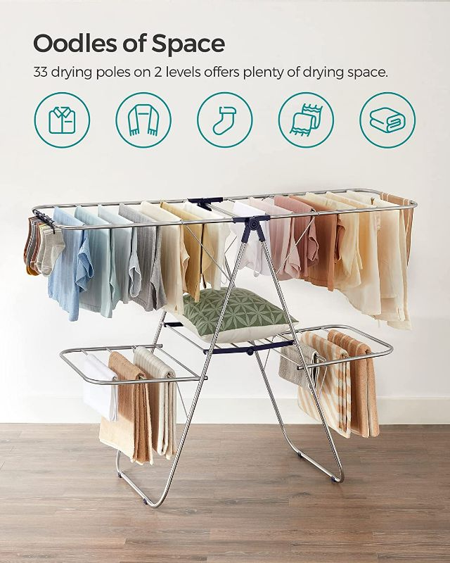 Photo 2 of SONGMICS Clothes Drying Rack, Foldable 2-Level Laundry Drying Rack, Free-Standing Large Drying Rack, with Height-Adjustable Wings, 33 Drying Rails, Sock Clips, Silver and Blue