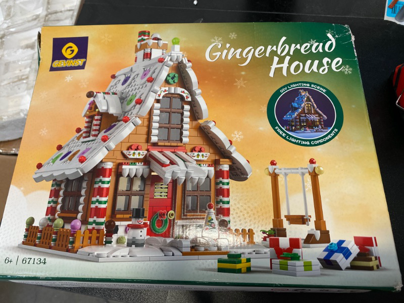Photo 2 of Christmas Gingerbread House kit Building Block Set Toys, ?with led Light, A Great Holiday Present Idea for Christmas (1,455 Pieces) 
