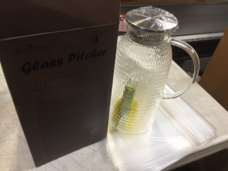 Photo 1 of Aofmee Pitcher, 81oz Glass Pitcher, Water Pitcher with Lid, Iced Tea Pitcher Lemonade Pitcher, Glass Carafe for Cold or Hot Beverages, Sun Tea Jar, Easy Clean Heat Resistant Glass Jug for Juice, Milk
