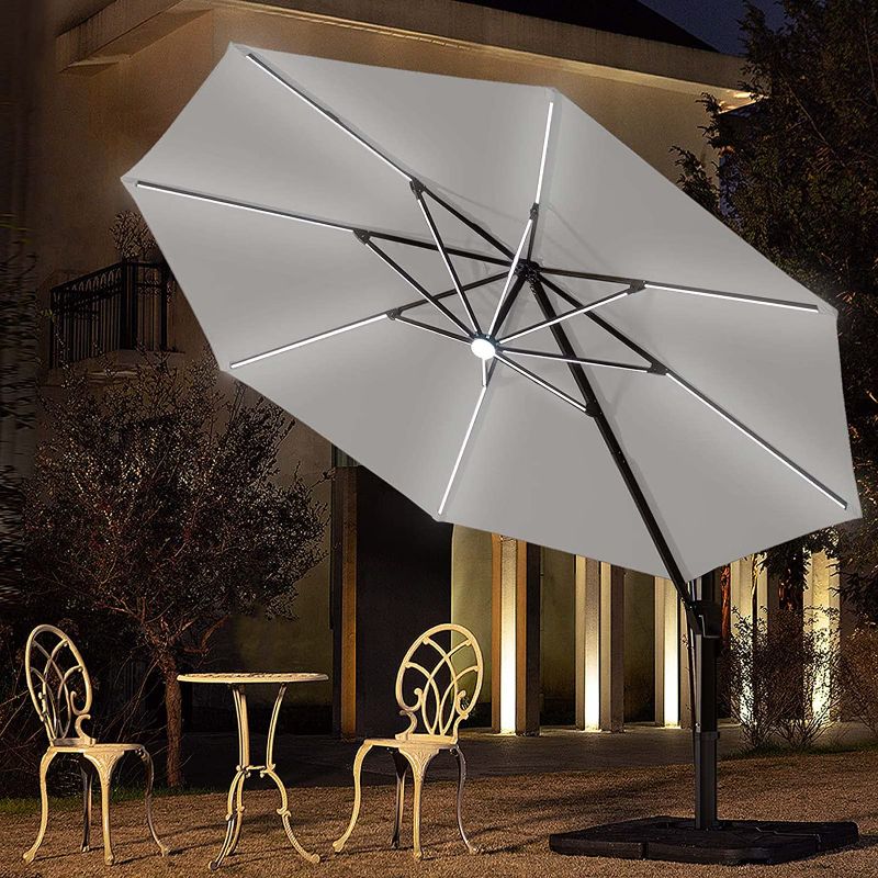 Photo 1 of BLUU Sequoia 12 FT Solar Cantilever Umbrella LED Aluminum Offset Umbrella with 15 Strip Lights and Center Light, Recycled Fabric 36 Month Fade Resistance, 360° Rotation & Cross Base (Dark Grey)
