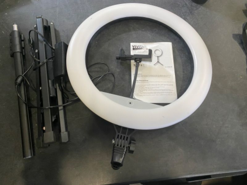 Photo 2 of Vivitar 18-inch LED Ring Light Set with Adjustable 63-inch Light Stand,  Adjustable Locking Phone Cradle, Soft Carry Case OPEN BOX. CONDITION SOLD AS IS, UNTESTED.