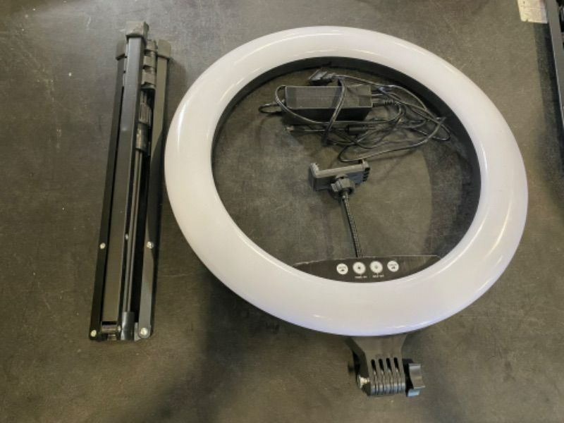 Photo 2 of Vivitar 18-inch LED Ring Light Set with Adjustable 63-inch Light Stand, Adjustable Locking Phone Cradle, Soft Carry Case OPEN BOX. CONDITION SOLD AS IS, UNTESTED.