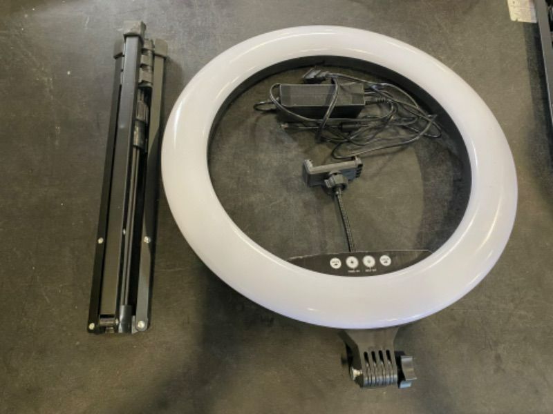 Photo 1 of Vivitar 18-inch LED Ring Light Set with Adjustable 63-inch Light Stand, Adjustable Locking Phone Cradle, Soft Carry Case OPEN BOX. CONDITION SOLD AS IS, UNTESTED.