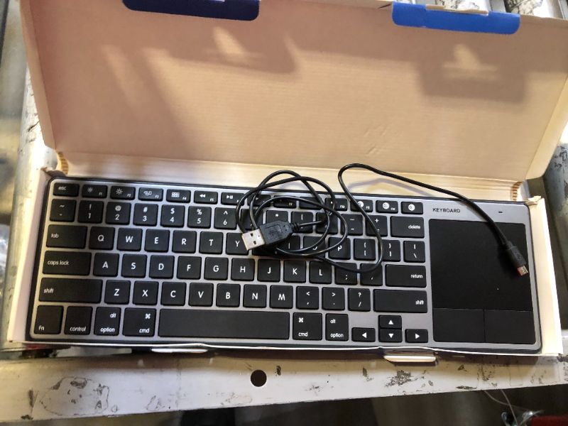 Photo 1 of keyboard with trackpad