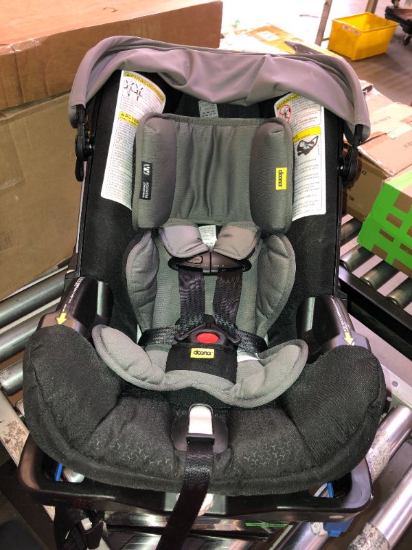 Photo 1 of Doona Infant Car Seat & Latch Base - Rear Facing, Car Seat to Stroller in Seconds - US Version, Greyhound