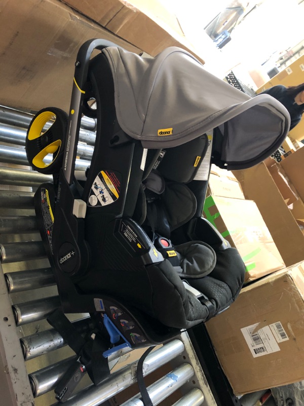 Photo 1 of Doona Infant Car Seat & Latch Base - Rear Facing, Car Seat to Stroller in Seconds - US Version, Greyhound