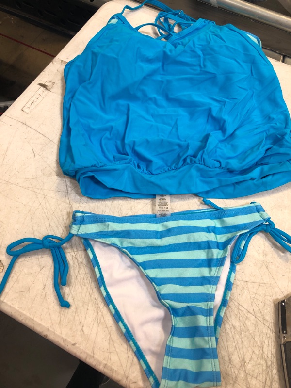 Photo 1 of WOMENS SIZE SMALL SWIM SUIT