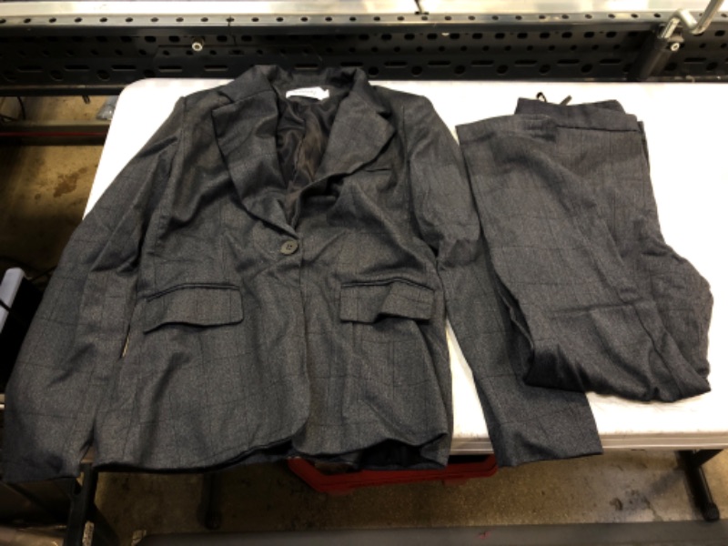 Photo 1 of 2 PIECE SUIT 
PANTS AND JACKET 
SIZE XSMALL 