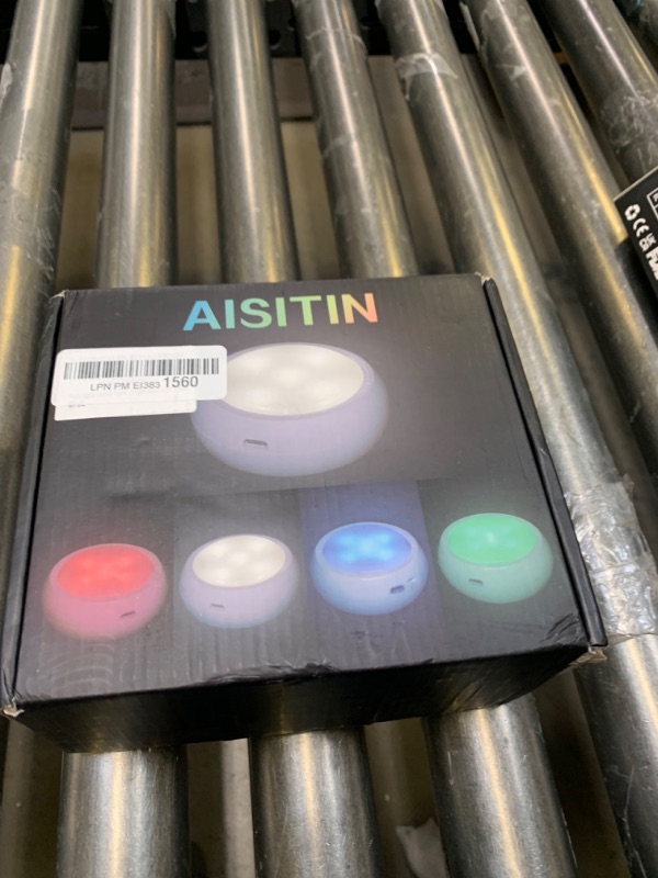 Photo 2 of AISITIN Puck Lights Battery Operated Lights with Remote Control, 8 Pack Closet Lights Under Cabinet Light 16 Colors 3 Modes (6000K/4000K/RGB), LED Closet Light with 2 USB Cables --- Box Packaging Damaged, Item is New

