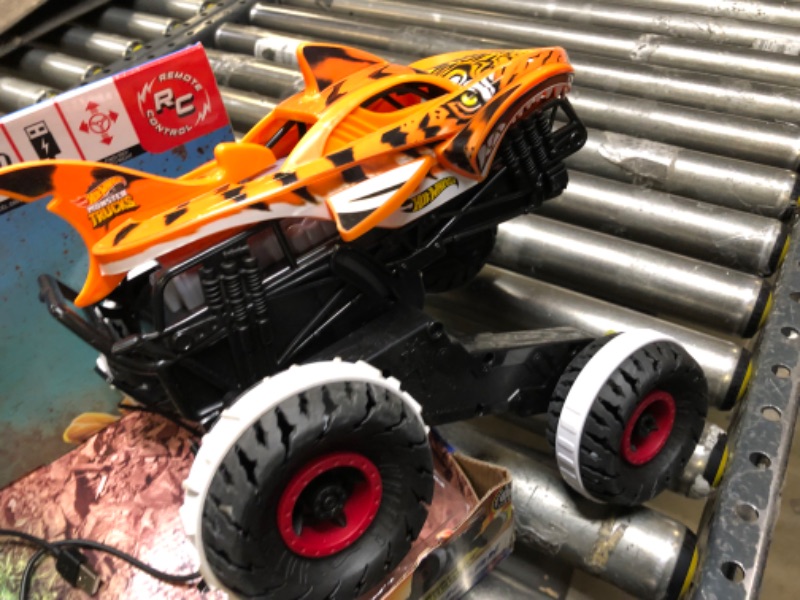 Photo 2 of Hot Wheels Monster Trucks, Remote Control Car, Monster Truck Toy with All-Terrain Wheels, 1:15 Scale Unstoppable Tiger Shark RC