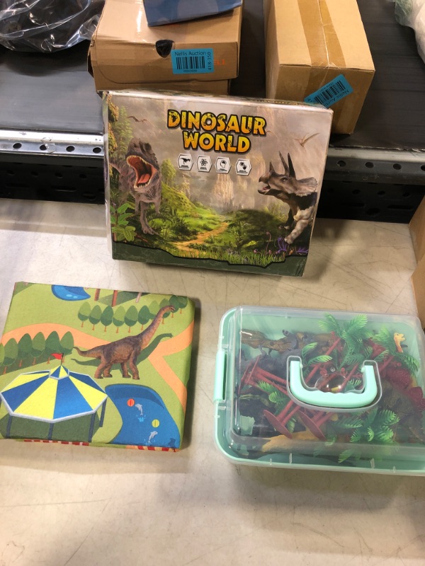 Photo 1 of DINOSAUR WORLD - JURASSIC WORLD DINOSAUR TOYS , INCLUDES PLAY MAT 31.5” X 27.5”
