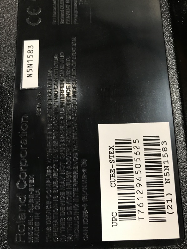 Photo 1 of Roland CUBE Street EX 4-Channel 50-Watt Battery Powered Amplifier & Amazon Basics Adjustable Boom Height Microphone Stand with Tripod Base, Up to 85.75 Inches - Black