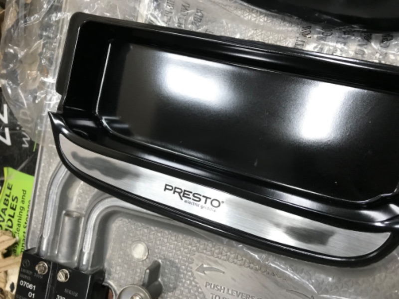 Photo 4 of **MINOR WEAR & TEAR**Presto 07061 22-inch Electric Griddle With Removable Handles, Black, 22-inch