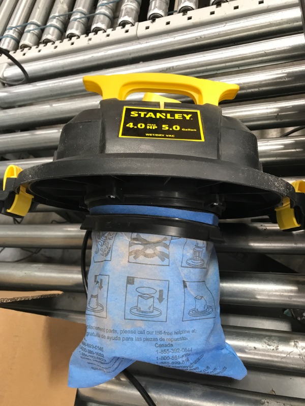 Photo 3 of **MINOR TEAR & WEAR**STANLEY SL18115 Wet/Dry Vacuum, 5 Gallon, 4 Horsepower, Stainless Steel Tank, 4.0 HP, 50" Sealed Pressure, Silver+Yellow