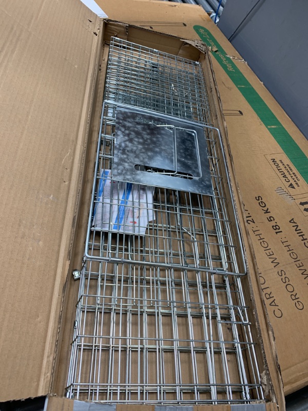 Photo 2 of Used *** SZHLUX 32" X 10" X 12" Live Animal Cage Trap, Heavy Duty Folding Raccoon Traps, Humane Cat Trap for Stray Cats, Raccoons, Squirrel, Skunk, Mole, Groundhog, Armadillo, Rabbit, Catch and Release.