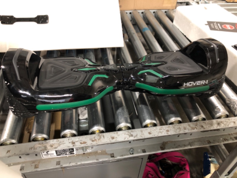 Photo 3 of ****PARTAS ONLY****Hover-1 Superfly Electric Hoverboard, 7MPH Top Speed, 6 Mile Range, Long Lasting Li-Ion Battery, 5HR Full Charge, Built-In Bluetooth Speaker, Rider Modes: Beginner to Expert, Black