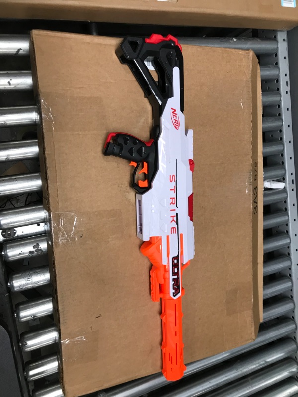 Photo 1 of **MISSING MAGAZINE & BULLETS**NERF Ultra Strike Motorized Blaster, 10 AccuStrike Ultra Darts, 10-Dart Clip, Integrated Sight, Compatible Only Ultra Darts