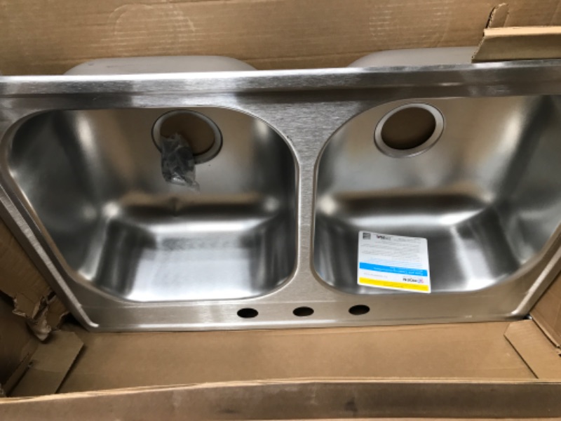 Photo 4 of ***Harware bag ripped, pieces may be missing.***
Moen GS202133Q 2000 Series 33-inch 20 Gauge Drop-in Double Bowl Stainless Steel Kitchen Sink, Featuring QuickMount