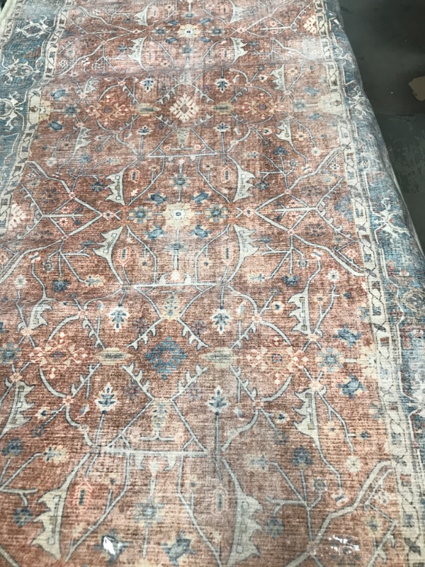 Photo 1 of 2'6" x 6'10" Area Rug Red, blue , tan design plus standard base pad 