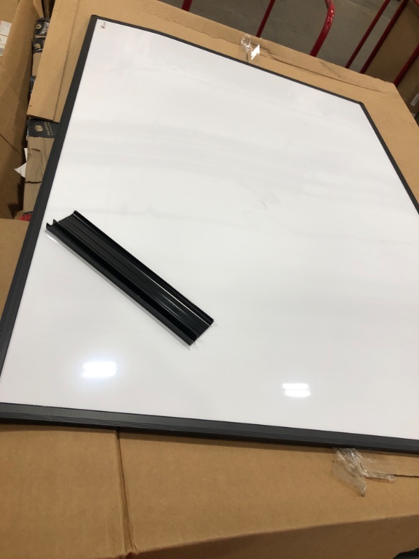 Photo 1 of 35" x 47" White Board-  Minor damage from small dents/minor bending