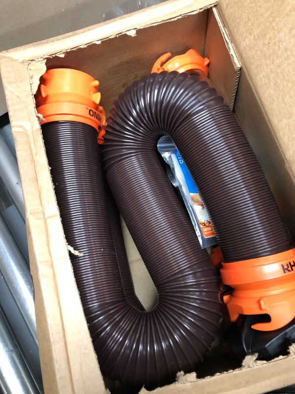 Photo 1 of Camco 20' (39742) RhinoFLEX 20-Foot RV Sewer Hose Kit, Swivel Transparent Elbow with 4-in-1 Dump Station Fitting-Storage Caps Included , Black , Brown 20ft Sewer Hose Kit Frustration-Free Packaging